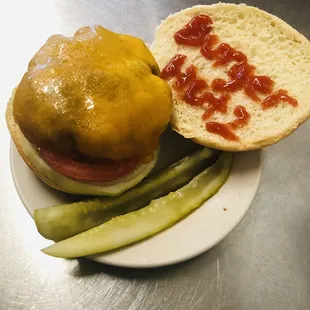 a pickle and a bun with ketchup