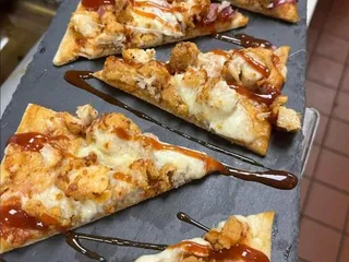 Jus1More Sports Bar and Grill