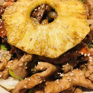 Amazing and massive chicken teriyaki bowl on a bed of rice and veggies