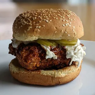 a chicken sandwich on a plate