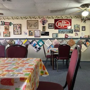 a dining room with tables and chairs