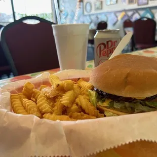 a basket of fries and a sandwich