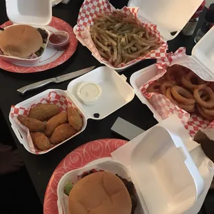 BBQ bacon burgers, fries, O rings, jalapeño pops