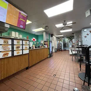 Order at the counter, choose your seating, self-serve drink station