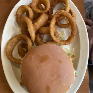 Chicken sandwich and onion rings. Large portion that my teenager who eats a bunch couldn't finish.