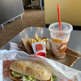 a sandwich and french fries on a table