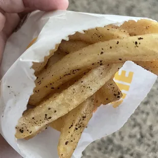 Fries in my child&apos;s kids meal, burnt seasonings? Not sure, not edible.