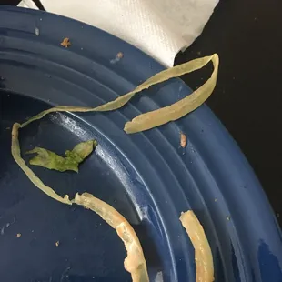 a blue plate with some food on it