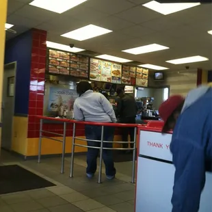 customers waiting in line at the counter