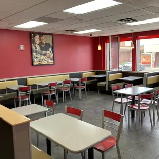 empty tables and chairs in a restaurant