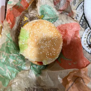 a hamburger and fries on a table