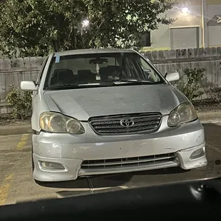 Here is the pic of an employee sitting in their car and in the other picture is the employees car that&apos;s inside ignoring people .