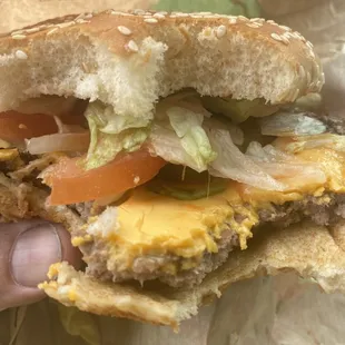 The meat patty wasn't hit enough to melt the cheese   - sad.