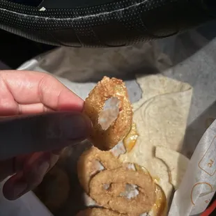 THE REFRIED (ONION RING THAT WAS BITTEN (by me).