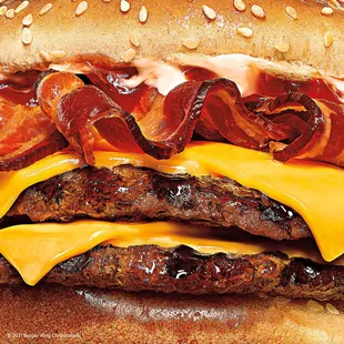 bacon and cheese on a bun