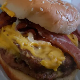 bacon and cheese on a bun