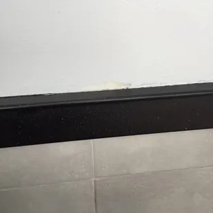 Paint off walls in places!