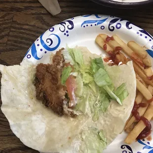 A half A piece of old chicken bunch of lettuce I want a little tomato.