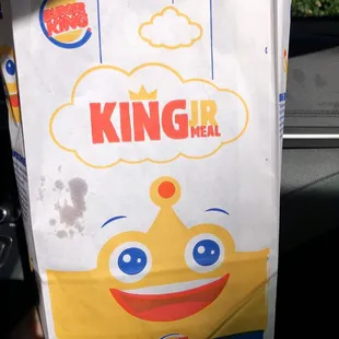 a paper bag with a face on it