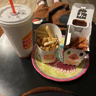 fries and a drink on a table