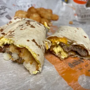 a breakfast burrito with eggs and sausage