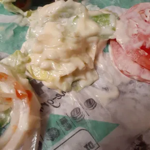 Pile of mayo that the rude employee dumped on my burger.