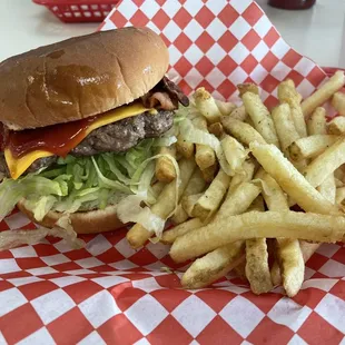 a hamburger and fries in a basket