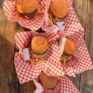 A double burger with fries