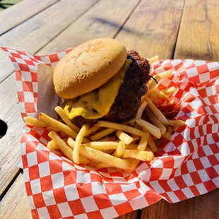 Fancy double cheeseburger with fries