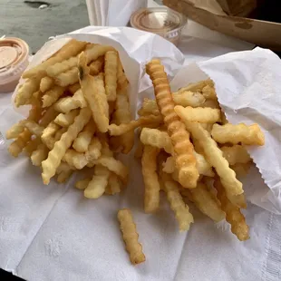 Two huge orders of fries that came with our combos