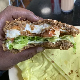 Fish sandwich mania served with fries or salad