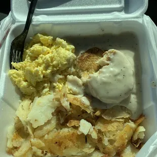 Biscuits and 2 Country Biscuits, Gravy and Eggs (I took a bite out of it first )