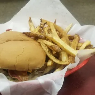 a basket of fries and a sandwich