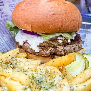 a plate of french fries and a sandwich