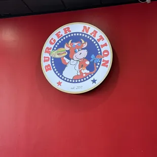 the logo on the wall of a restaurant