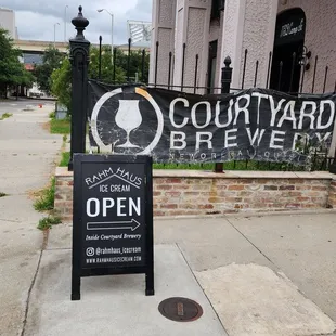 Front of Courtyard Brewery where you enter and go inside to order burger.