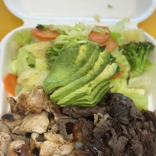 Chicken and beef bowl with avocado.