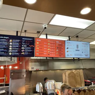 menus on the wall of a restaurant