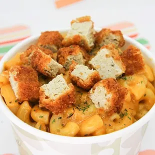 CRISPY CHICKN MAC Build any bowl of mac and cheese just how you like it! Add plant-based chicken tenders, spice it up add extra sauces!