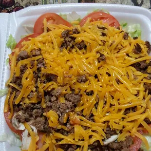 Beef salad: salad topped with ground beef and cheese
