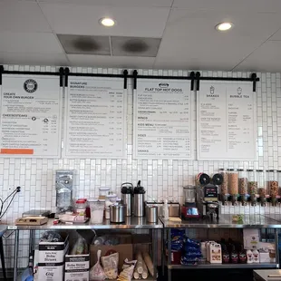 menus on the wall of a restaurant