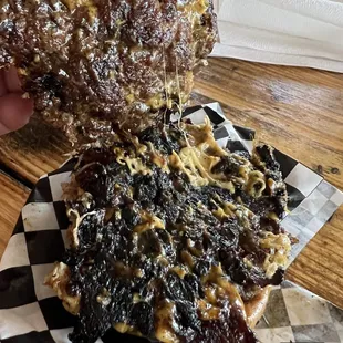 A nice layer of charcoal in between. I have a thing about complaining, in case they spit in my food. That's why I ate this $16 abomination.