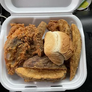 &quot;Chicken snack&quot;. Two pieces of chicken and potato wedges.