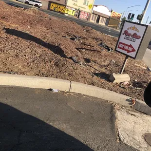 a sign in the middle of the street