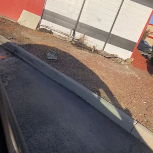 a car parked in front of a garage