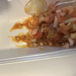 a salad in a plastic container
