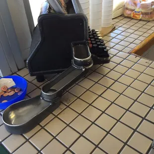 Old time change machine. It spit out a 50 cent piece!