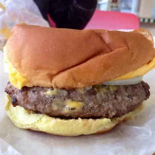 Simple burger.  No frills, lots of flavor.