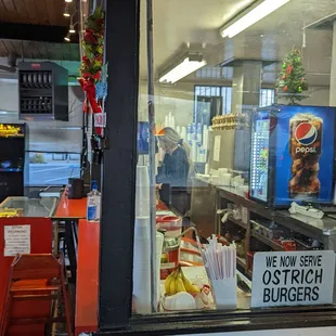 a view of the kitchen through the window