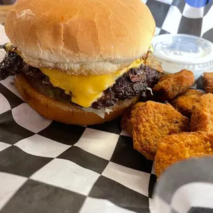 a burger and fried tater tots